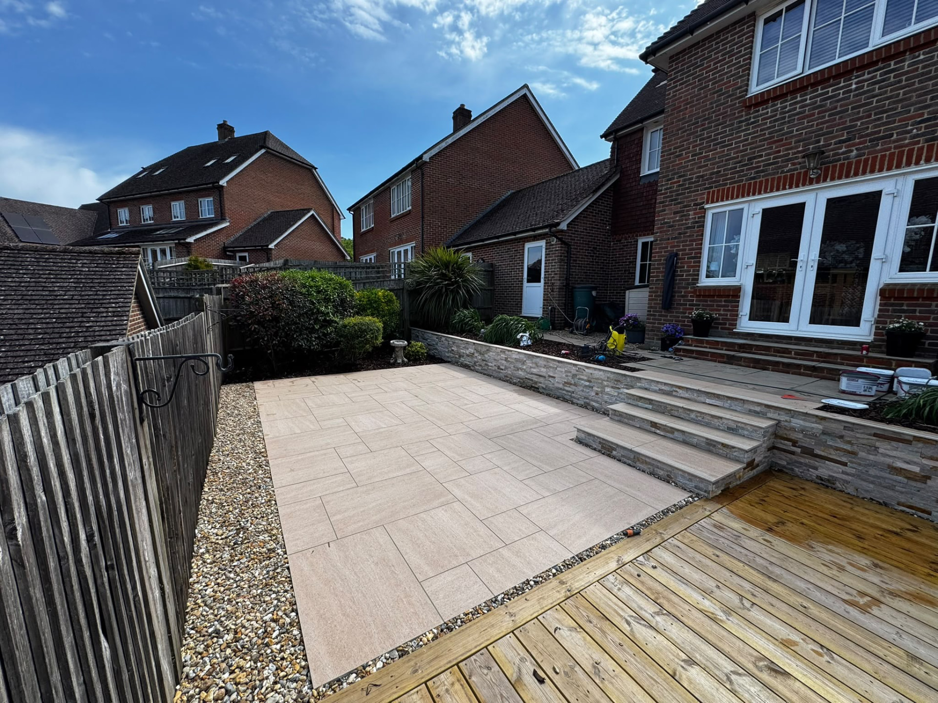 Porcelain patio and landscaped garden by JHD